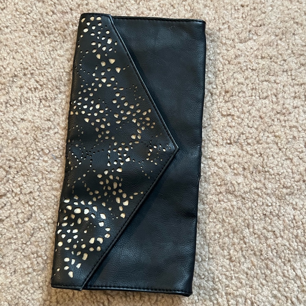 black clutch with gold designs